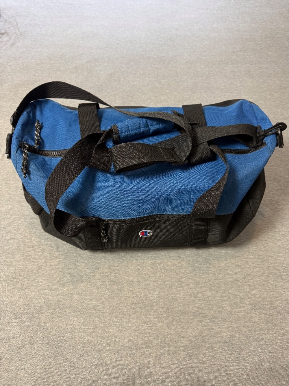 Champion duffel bag blue and black in good condition